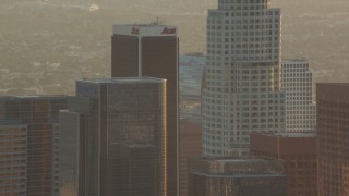 HDA06_21 - HD stock footage aerial video tops of skyscrapers at sunset in Downtown Los Angeles, California