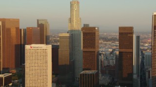 HDA06_29 - HD stock footage aerial video US Bank Tower and skyscrapers at sunset in Downtown Los Angeles, California