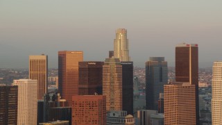 HDA06_39 - HD stock footage aerial video group of Downtown Los Angeles skyscrapers at sunset, California