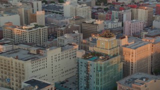 HDA06_50 - HD stock footage aerial video of the Eastern Columbia Building and Orpheum Theater at sunset, Downtown Los Angeles, California