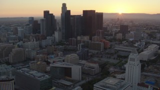 HDA06_55 - HD stock footage aerial video flyby top of Los Angeles City Hall at sunset, approach Downtown Los Angeles, California