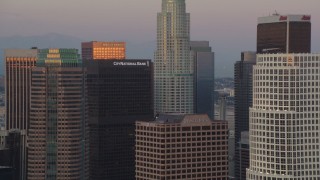 HDA06_59 - HD stock footage aerial video skyscrapers near US Bank Tower at twilight in Downtown Los Angeles, California