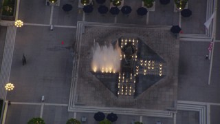 HDA06_73 - HD stock footage aerial video bird's eye view of a fountain at twilight in Downtown Los Angeles, California