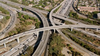 HDA07_03 - HD stock footage aerial video of the I-5 and 118 interchange, San Fernando Valley, California