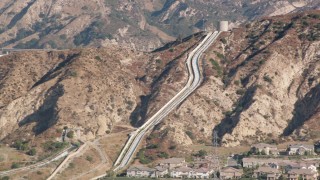 HDA07_08 - HD stock footage aerial video of the Los Angeles Aqueduct in San Fernando Valley, California