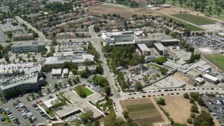 HDA07_40 - HD stock footage aerial video fly over I-5 to reveal hospital in Mission Hills, California