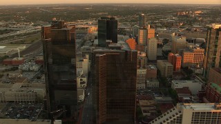 HDA12_004 - HD stock footage aerial video of Wells Fargo and DR Horton Tower skyscrapers at sunset, Downtown Fort Worth, Texas