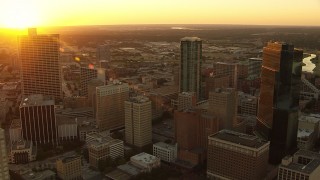 HDA12_008 - HD stock footage aerial video flyby high-rise buildings at sunset in Downtown Fort Worth, Texas