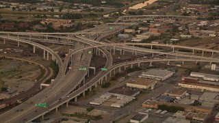 HDA12_012 - HD stock footage aerial video of freeway interchanges at sunset, Downtown Fort Worth, Texas