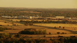 HDA12_071 - HD stock footage aerial video of factory at sunrise in Duncan, Oklahoma