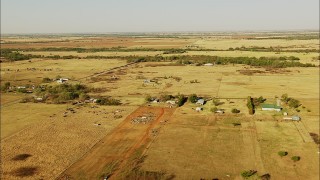 HDA12_074 - HD stock footage aerial video of farms and farmhouses in Duncan, Oklahoma