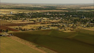 HDA12_095 - HD stock footage aerial video of the town of Walters and farm fields in Oklahoma