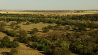 HDA12_113 - HD stock footage aerial video of farm fields and trees in Oklahoma