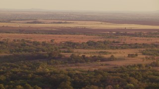 HDA12_139 - HD stock footage aerial video of farmland and rural countryside at sunset in Oklahoma