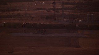 HDA12_181 - HD stock footage aerial video of a train running through the countryside at night in Decatur, Texas