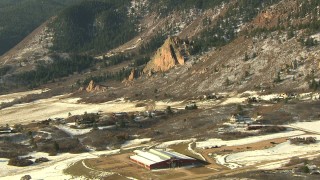 HDA13_285 - HD stock footage aerial video of approaching rural homes at the base of Rocky Mountains, Colorado