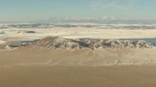 HDA13_307 - HD stock footage aerial video of Spinney Mountains with snow and lake in Park County, Colorado