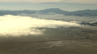 HDA13_310 - HD stock footage aerial video of the fog-covered Antero Reservoir in Park County, Colorado