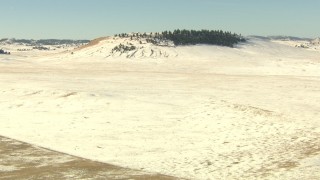 HDA13_314 - HD stock footage aerial video descend toward snowy hills in Park County, Colorado