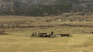 HDA13_347 - HD stock footage aerial video of grazing fields and cattle in Ridgway, Colorado