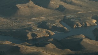 HDA13_417 - HD stock footage aerial video of piers on the Blue Mesa Reservoir at sunrise, Colorado