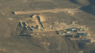 HDA13_425 - HD stock footage aerial video of industrial buildings at sunrise in Gunnison, Colorado