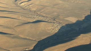 HDA13_428 - HD stock footage aerial video of a sparsely populated rural area at sunrise, Gunnison, Colorado
