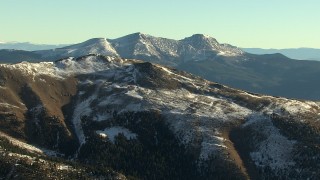 HDA13_449 - HD stock footage aerial video of snowy slopes at sunrise, Rocky Mountains, Colorado