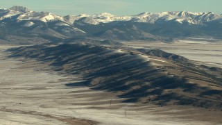 HDA13_463 - HD stock footage aerial video of a ridge and snowy Rocky Mountains in Park County, Colorado