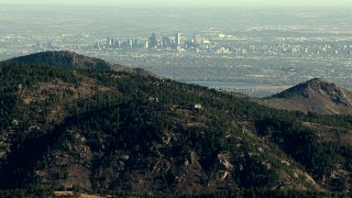 HDA13_482_01 - HD aerial stock footage video of a view of Downtown Denver and the lake seen from the Rocky Mountains, Colorado