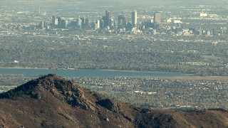 HDA13_482_02 - HD stock footage aerial video of Downtown Denver and Marston Lake seen from the Rocky Mountains, Colorado