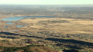 HDA13_483 - HD stock footage aerial video of Denver, reservoir, and Roxborough Park seen from Rocky Mountains, Colorado