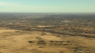 HDA13_484 - HD stock footage aerial video of the Downtown Denver skyline and surrounding suburbs in Colorado
