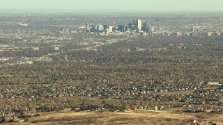 HDA13_485_04 - HD stock footage aerial video of zooming to a closer view of Downtown Denver and suburbs in Colorado