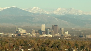 HDA13_488_03 - HD stock footage aerial video of massive Rocky Mountains behind Downtown Denver, Colorado