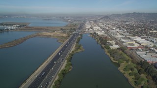 JDC01_002 - 5K stock footage aerial video of flying over Interstate 80 freeway, Aquatic Park, Berkeley, California