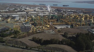 JDC01_034 - 5K aerial stock footage of approaching the Valero Oil Refinery, Benicia, California