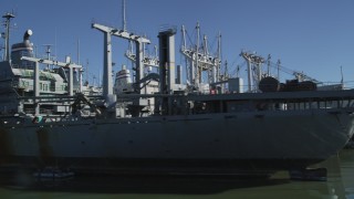 JDC01_042 - 5K stock footage aerial video tilt to reveal National Defense Reserve Fleet warships, Suisun Bay, California