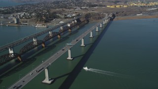 JDC01_051 - 5K aerial stock footage tilt from yacht near bridges to wider view of Carquinez Strait and Benicia-Martinez Bridge, California
