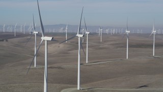 JDC01_067 - 5K stock footage aerial video of flying by windmills at Shiloh Wind Power Plant, Montezuma Hills, California