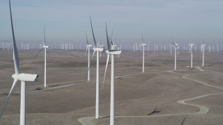 JDC01_068 - 5K aerial stock footage of flying by field of windmills, Shiloh Wind Power Plant, Montezuma Hills, California