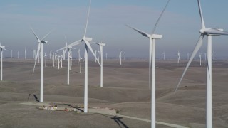 JDC01_073 - 5K aerial stock footage of flying by rows of windmills, Shiloh Wind Power Plant, Montezuma Hills, California
