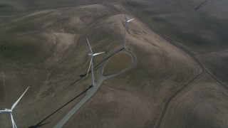 JDC01_078 - 5K aerial stock footage of orbiting three windmills, Shiloh Wind Power Plant, Montezuma Hills, California
