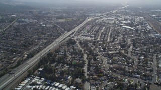 JDC01_089 - 5K stock footage aerial video of flying by a freeway and suburban neighborhoods, Concord, California