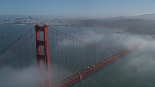 JDC02_026 - 5K stock footage aerial video approach the city while flying over the Golden Gate Bridge, Downtown San Francisco, California