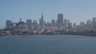 JDC02_037 - 5K aerial stock footage of Fisherman's Wharf and city skyline seen from the bay, Downtown San Francisco, California