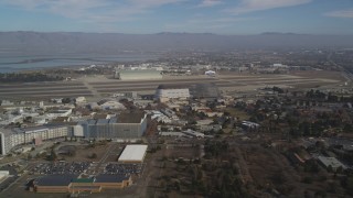 JDC03_020 - 5K stock footage aerial video approach Moffett Field, Hangar One, NASA Ames Research Center, Mountain View, California