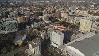 JDC04_007 - 5K stock footage aerial video tilt from museum and convention center for wider view of Downtown San Jose, California