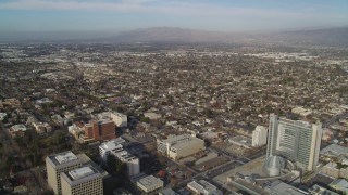 JDC04_009 - 5K stock footage aerial video of flying over downtown to approach urban neighborhoods, Downtown San Jose, California