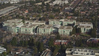 JDC04_015 - 5K aerial stock footage of flying by Apple Headquarters office buildings, Cupertino, California